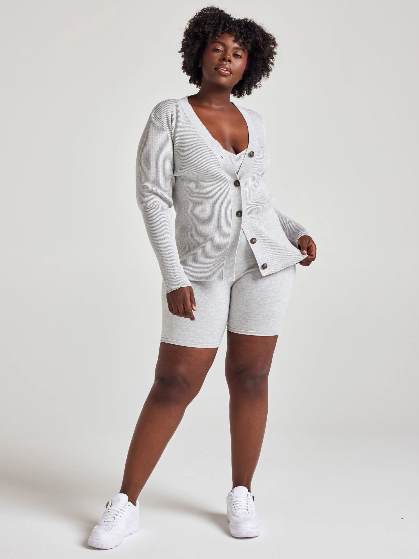 model wears cozy rib knit cardigan in grey