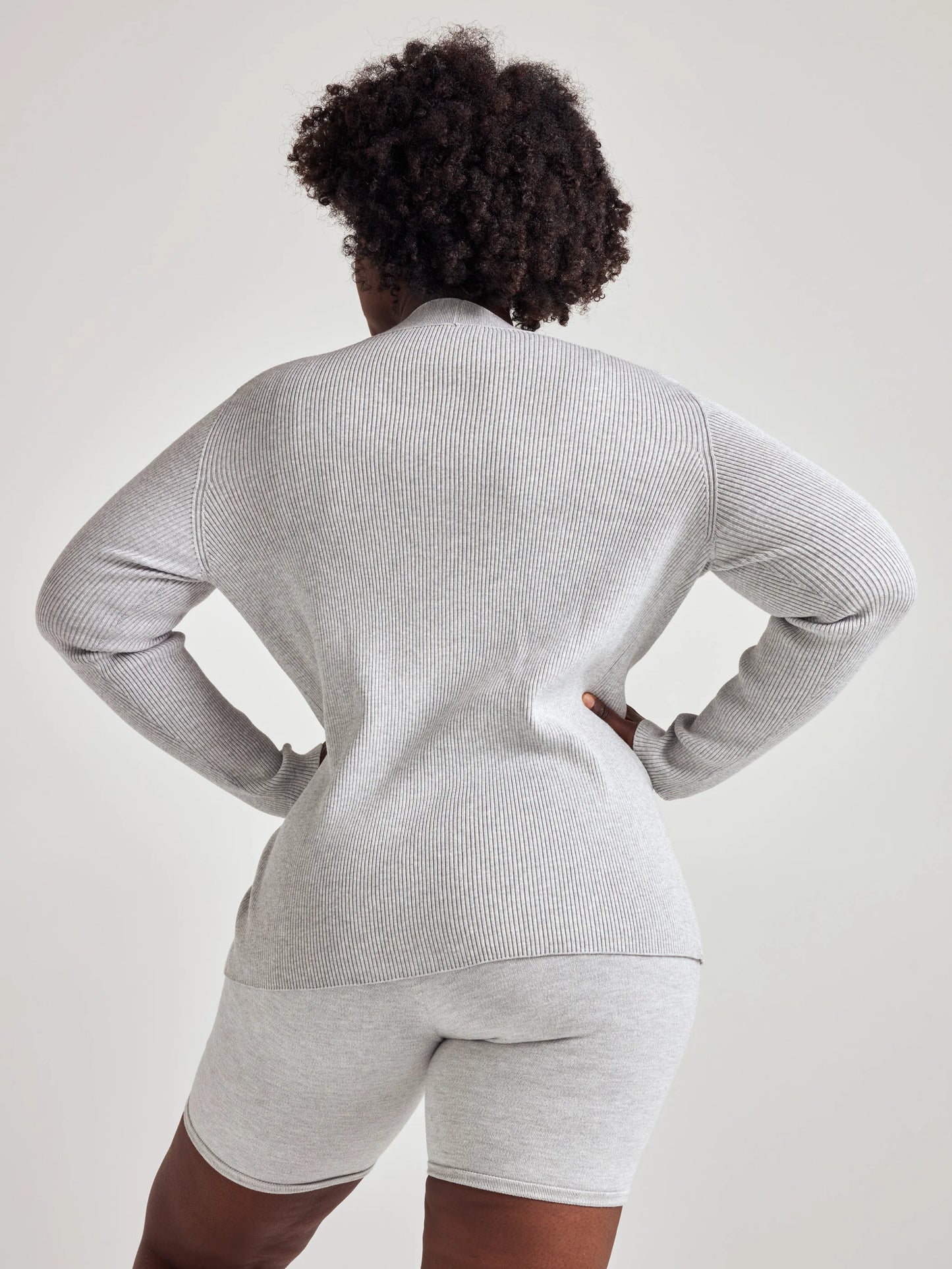model wears cozy rib knit cardigan in grey
