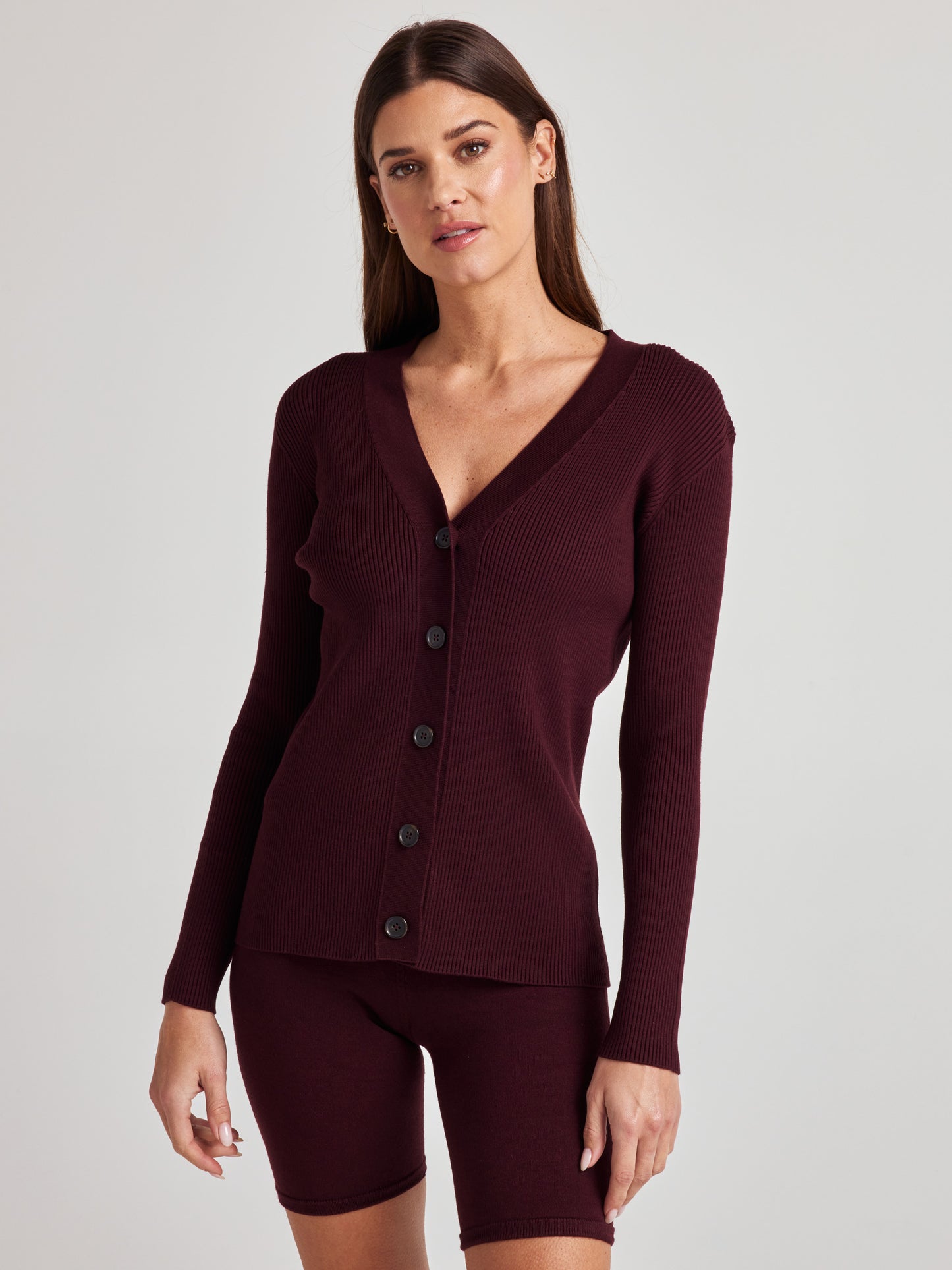 model wears cozy rib knit cardigan in burgundy