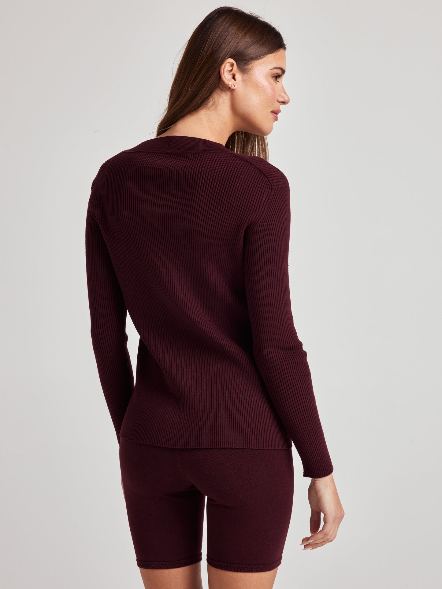 model wears cozy rib knit cardigan in burgundy