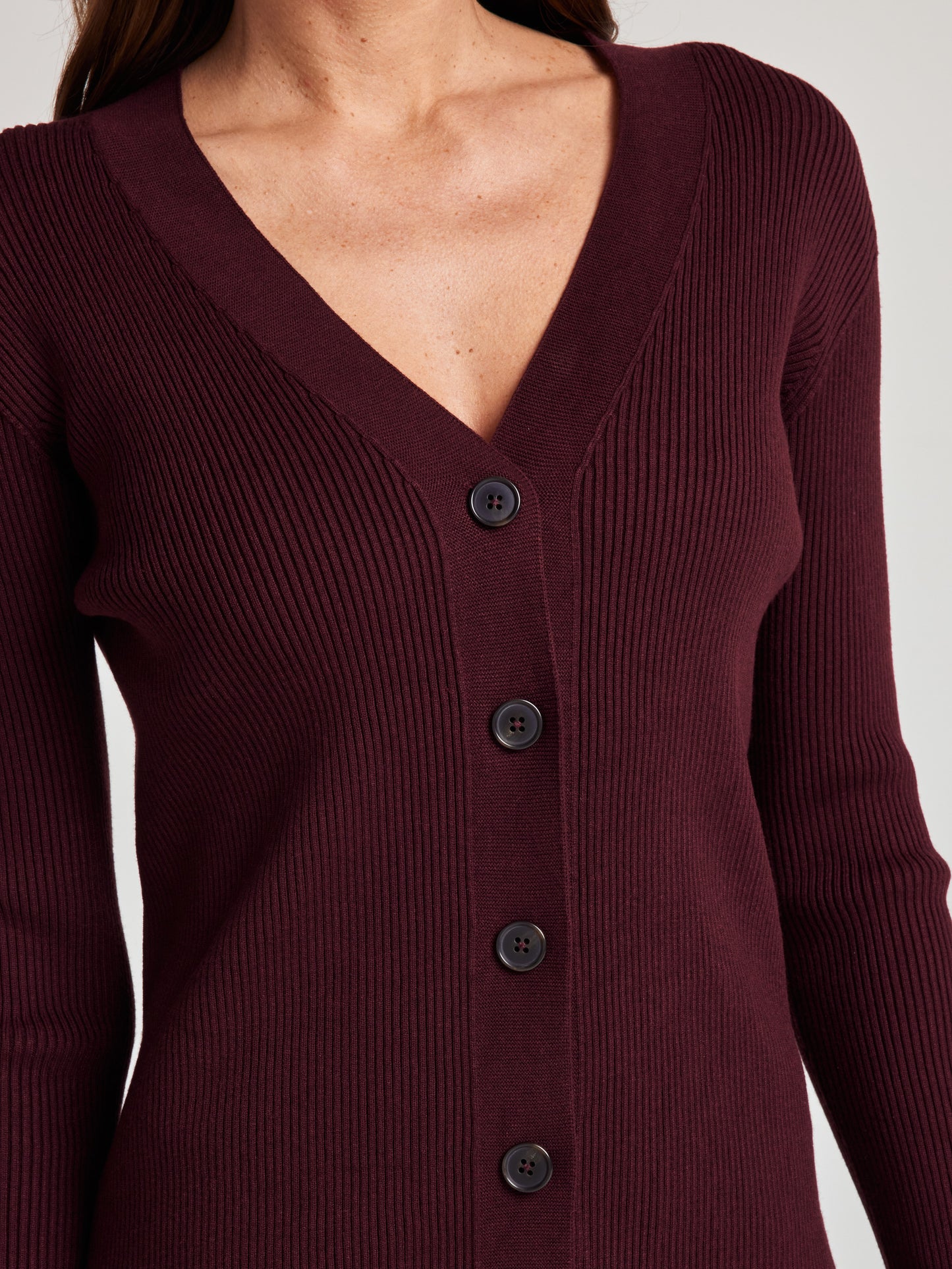 model wears cozy rib knit cardigan in burgundy