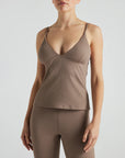 Model wears light brown rib triangle tank with built in bra