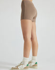 model wears light brown 3 inch inseam rib shorts