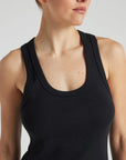 Model wears black luxury ribbed tank