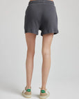 model wears retro waffle knit gym shorts in charcoal