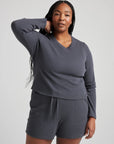 model wears organic thermal long sleeve in grey