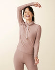model wears cozy cowl turtleneck rib sweater in blush