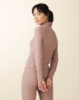 model wears cozy cowl turtleneck rib sweater in blush
