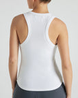 Model wears white luxury ribbed tank