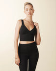 model wears cutest black colorblock sports bra with adjustable straps
