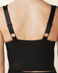 model wears cutest black colorblock sports bra with adjustable straps