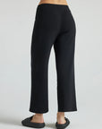 model wears black wide leg relaxed rib cropped pant