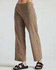 model wears light brown wide leg relaxed rib cropped pant