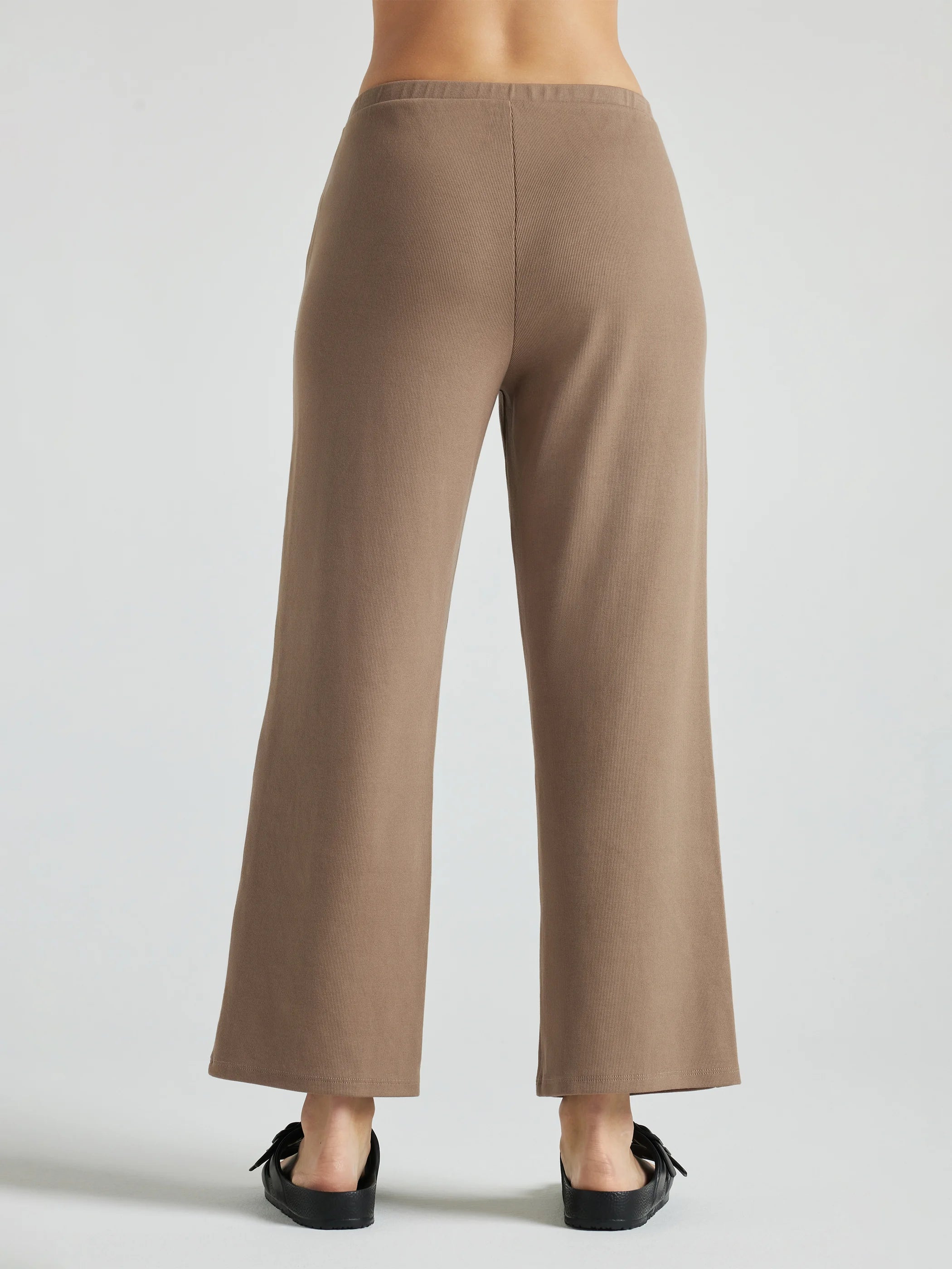 model wears light brown wide leg relaxed rib cropped pant