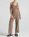 model wears light brown wide leg relaxed rib cropped pant