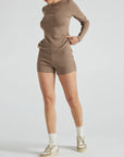 model wears light brown 3 inch inseam rib shorts