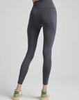 model wears sculpting grey pocket leggings