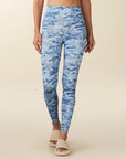 model wears blue Camo full length leggings