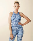 model wears blue camo racerback tank with built in bra