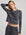 model wears organic thermal long sleeve in grey