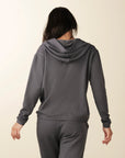 model wears cozy grey v neck hoodie