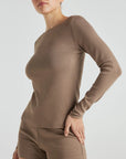 model wears light brown boat neck long sleeve