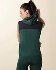 model wears green colorblock sleeveless hoodie