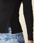 model wears black long sleeve active tee with panels